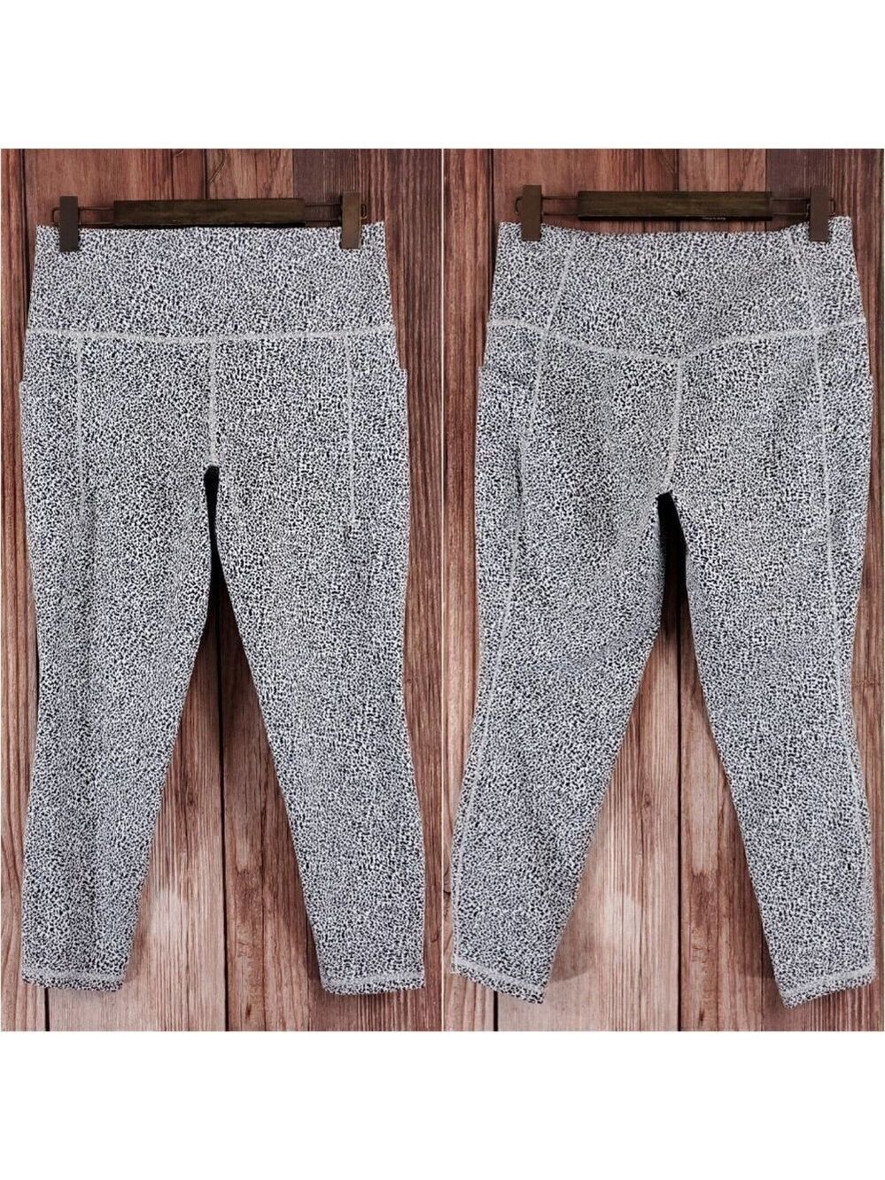 Athleta Womens Large Salutation Stash II Textured Tight Micro Cheetah 631936